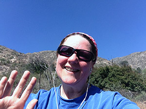Laurie waves good-bye from the mountain